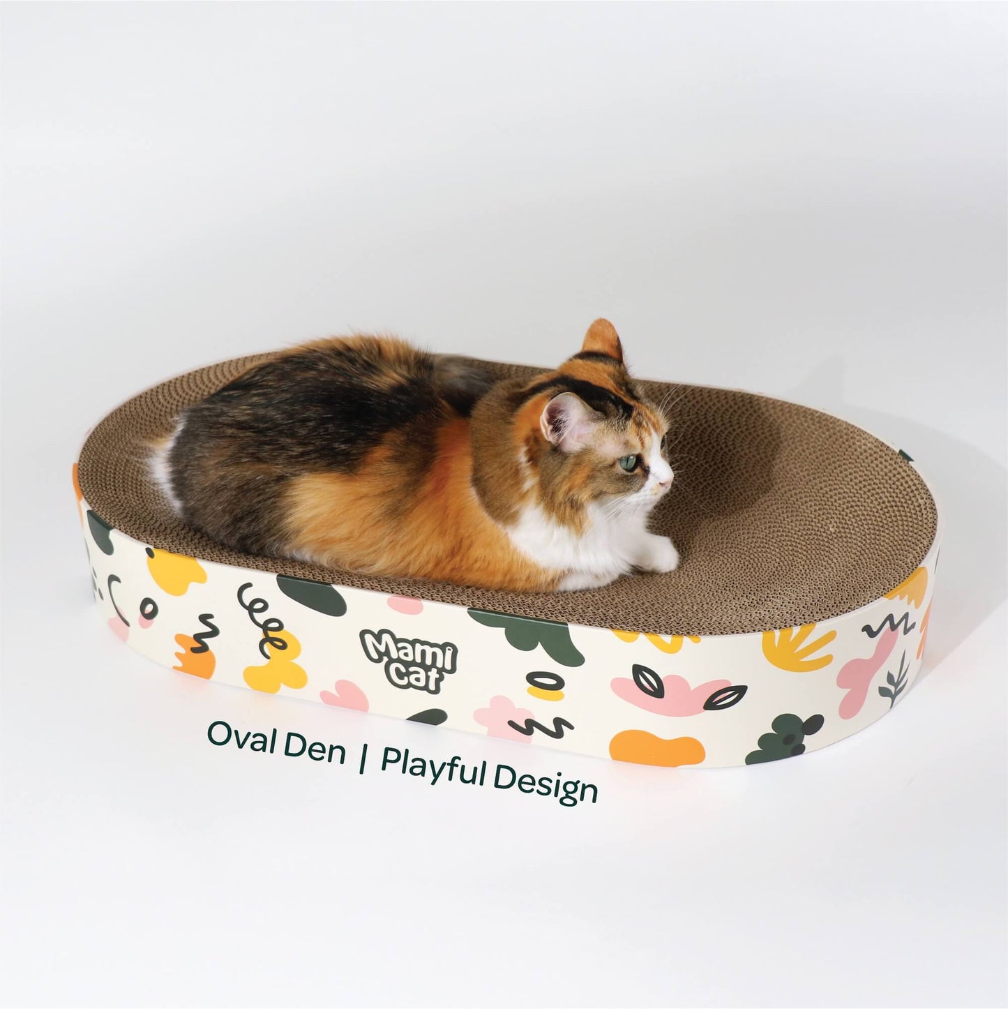 A Calico Cat nesting on top of Oval Den Cat Scratcher Board Playful Design.